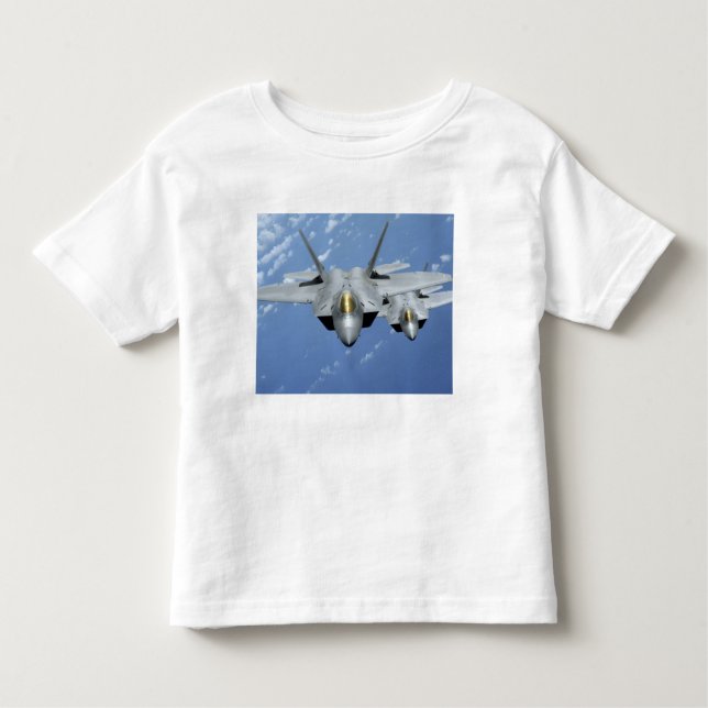 Camiseta Infantil Dois Raptores F-22 sobrevoam o Oceano Pacífico 2 (Frente)