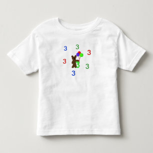 Camiseta Infantil Estou Três Com um Ursinho de Pelúcia e Balões