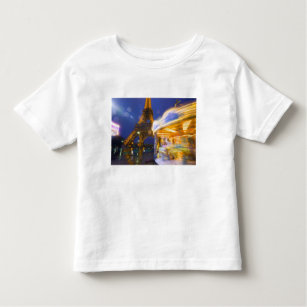 Camiseta Infantil França, Paris. Torre Eiffel em nevoeiro à luz e