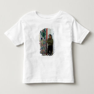 Camiseta Infantil Frank Stella ao lado de um de seu trabalha
