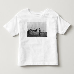 Camiseta Infantil Harriet Quimby em sua fotografia de avião