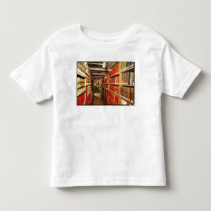 Camiseta Infantil Interior da loja do material impresso