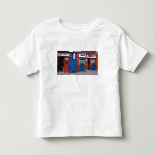 Camiseta Infantil Irlanda, Strandhill. Fachadas de lojas com bicicle