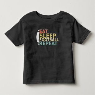 Camiseta Infantil Jogador de futebol come futebol