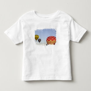 Camiseta Infantil Lançando balões de ar quente