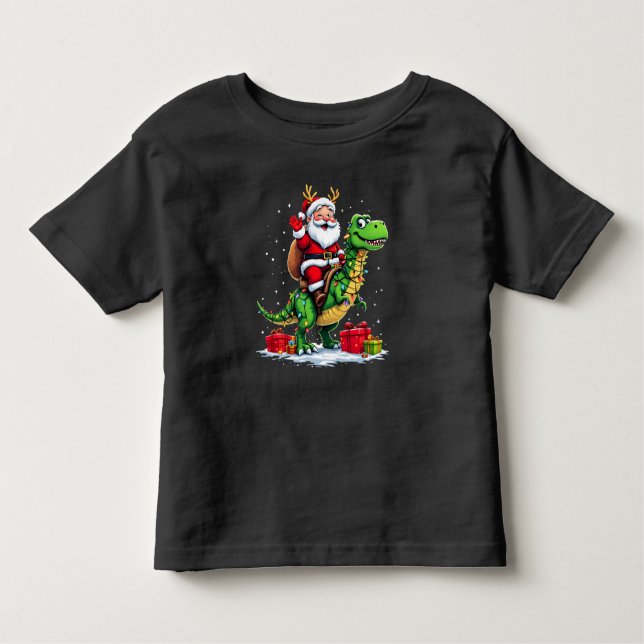 Camiseta Infantil Lustiger Weihnachtsmann auf Dino mit Lichterkette (Frente)