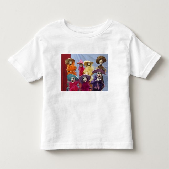 Camiseta Infantil México. Catrinas Esqueletais, figuras celebrando (Frente)