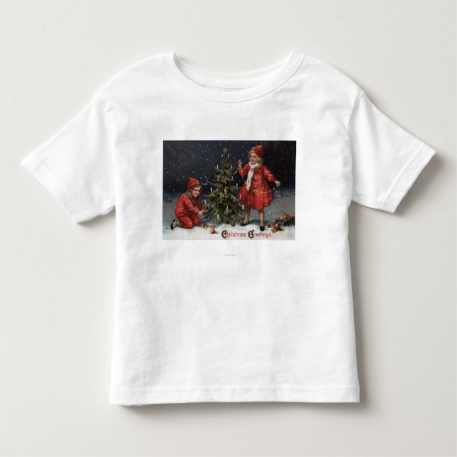 Camiseta Infantil Natal GreetingsKids que decora uma árvore (Frente)