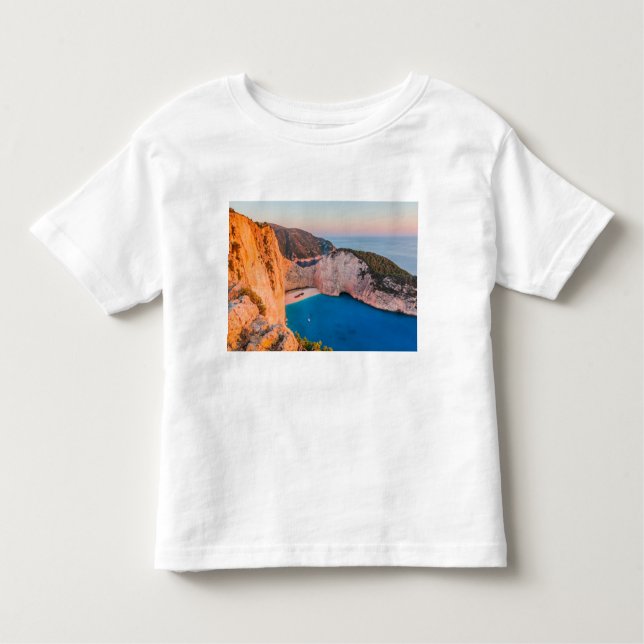 Camiseta Infantil Navagio Beach, Zakynthos, Grécia. (Frente)