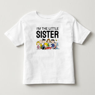 Camiseta Infantil O Gangue do Peanuts Eu Sou a Irmã Mais Nova