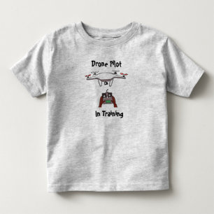 Camiseta Infantil O piloto do zangão no t-shirt do treinamento