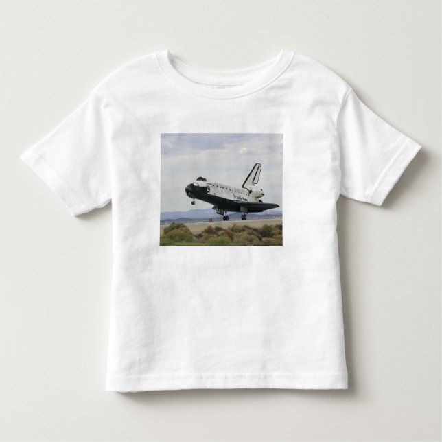 Camiseta Infantil O trem de aterrissagem principal da Space Shuttle  (Frente)