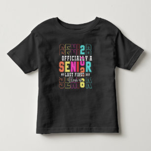 Camiseta Infantil Oficialmente Um Mais velho 2026 Meu Último Primeir