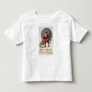 Camiseta Infantil Papai noel que enche a meia à borda