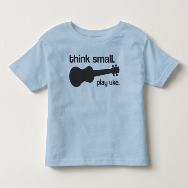 Camiseta Infantil "Pense pequeno. Jogue o uke." design (Frente)