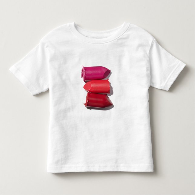 Camiseta Infantil Pilha de batom quebrado (Frente)