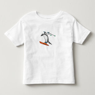 Camiseta Infantil Pinguim como saltador de esqui com Esqui