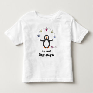 Camiseta Infantil Pinguim malabarizando cupcakes com pouco nome do a