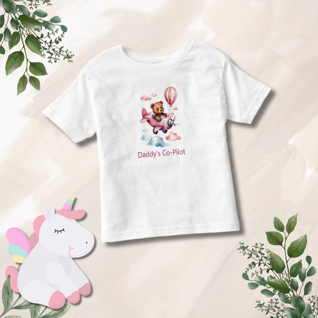 Camiseta Infantil Presente para garotinha do piloto de Pai de avião (Bear in Pink Airplane Toddler Girl Daddy's Co-Pilot T-shirt.)