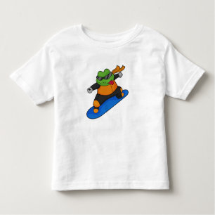 Camiseta Infantil Sapo como Snowobarder com Snowboard