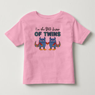 Camiseta Infantil Sou a Irmã das Gêmeas.