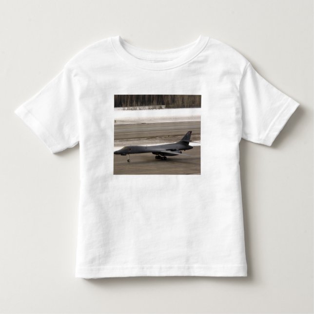 Camiseta Infantil Um B-1B Lancer executa um toque e vai (Frente)