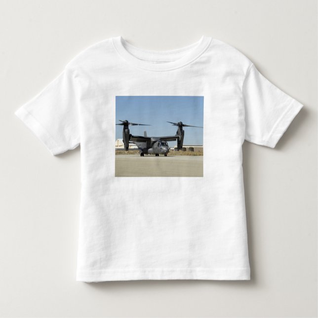 Camiseta Infantil Um CV-22 Osprey prepara-se para a descolagem (Frente)