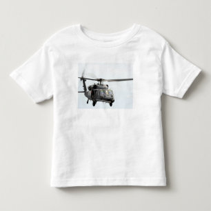 Camiseta Infantil Um HH-60 pavimenta o helicóptero do falcão