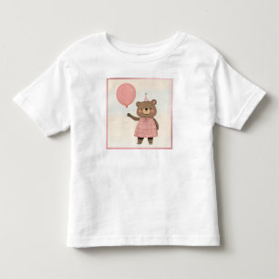 Camiseta Infantil Urso de vestimenta rosa com Xadrez e Arco