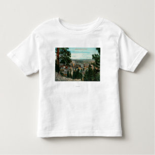 Camiseta Infantil Vista da cidade através das árvores