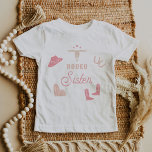 Camiseta Infantil WYNONA Blush Pink Cowgirl Rodeo Sister T-Shirt<br><div class="desc">This toddler t shirt features cute blush pink cowgirl graphics and the words 'rodeo sister' in a sweet rodeo font combination. This sister shirt is the perfect gift for your favorite sis as a pregnancy announcement or works great with the first rodeo themed birthday Wynona Collection.</div>