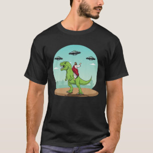 Camiseta Jesus Dirigindo Um Dinossauro Engraçado OVNI Alie