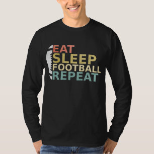 Camiseta Jogador de futebol come futebol