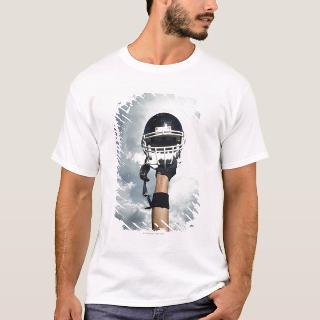 Camiseta Jogador de futebol que guardara o capacete no ar (Frente)