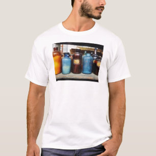 Camiseta Laranja, Brown e garrafas azuis dos produtos