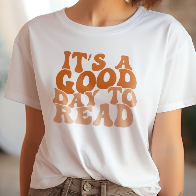 Camiseta Laranja É Um Bom Dia para Ler Livro (Criador carregado)