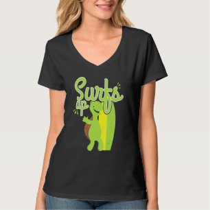 Camiseta Legal sobe a tartaruga surfando oceano