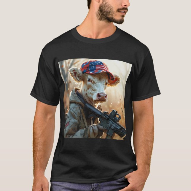Camiseta Legal Vaca MAGA com Arma e Camuflagem AMÉRICA Cura (Frente)