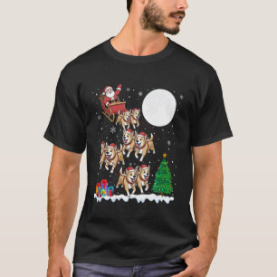 Camiseta Luzes de árvore de Natal Santa montando trenó Cão