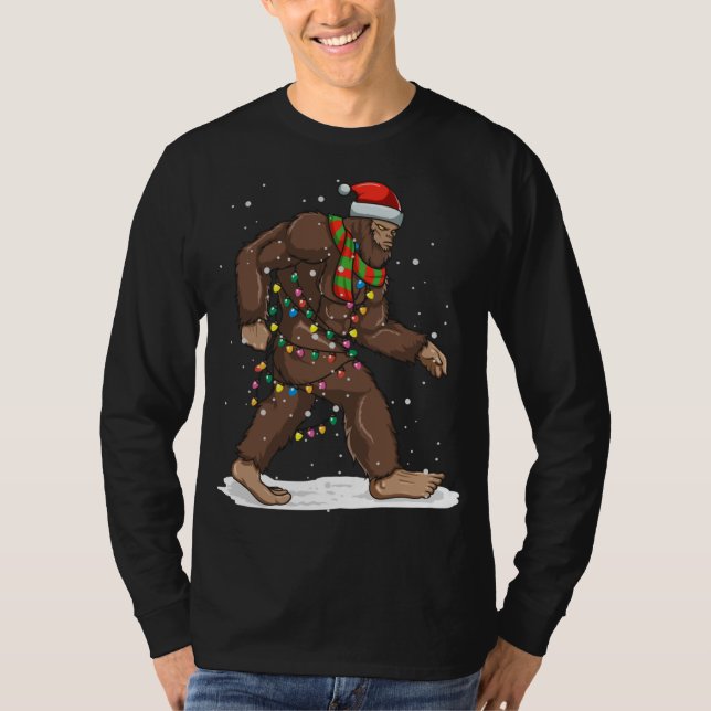 Camiseta Luzes de Natal Bigfoot Papais noeis de Sasquatch d (Frente)