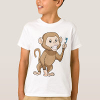 Macaco com escova de dentes