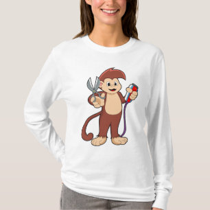 Camiseta Macaco como cabeleireiro com tesoura e Razor
