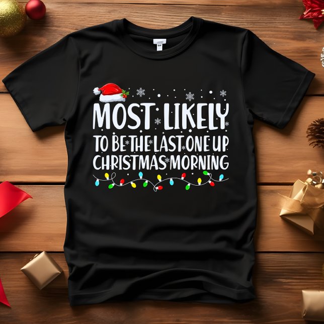 Camiseta Mais provável de ACORDAR PRIMEIRA MANHÃ DE NATAL (NIGHT OWL FUNNY CHRISTMAS PRESENT MOST LIKELY TO BE THE LAST ONE UP CHRISTMASS MORNING)