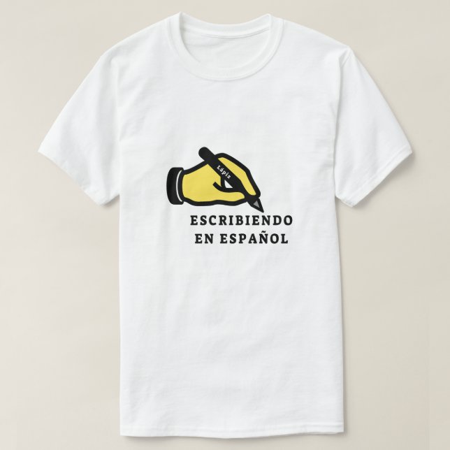 Camiseta Mão com lápis e texto: escribiendo en español (Frente do Design)