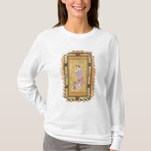 Camiseta Menina assentada que ondula seu cabelo em