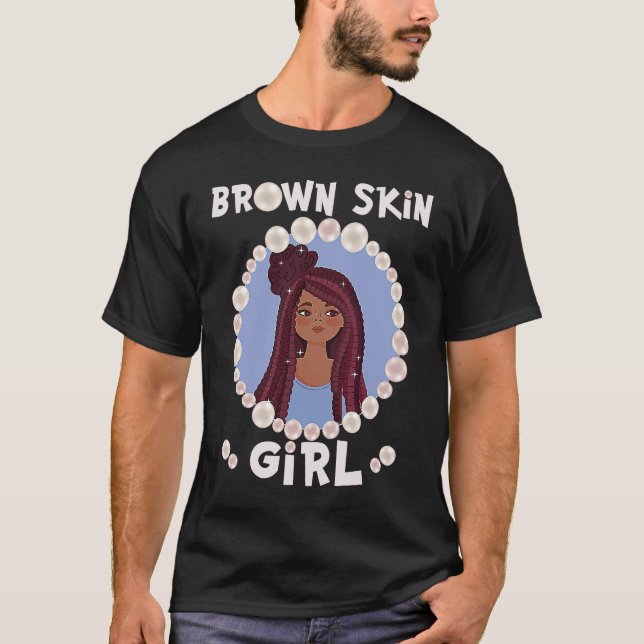 Camiseta Menina de pele castanha, pele como pérolas, tapete (Frente)