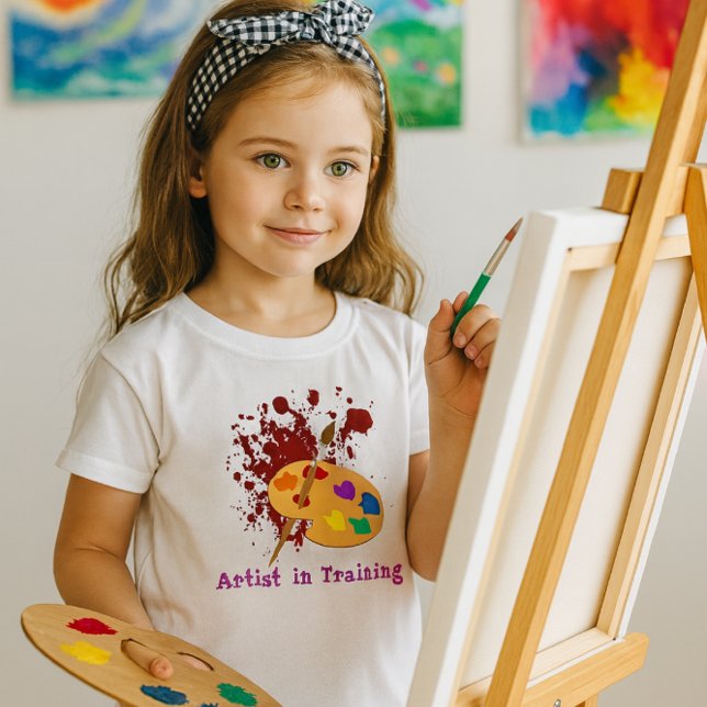 Camiseta Meninas Salpico de Tinta (Artist in Training” youth tee with vibrant palette graphic perfect for creative young painters)