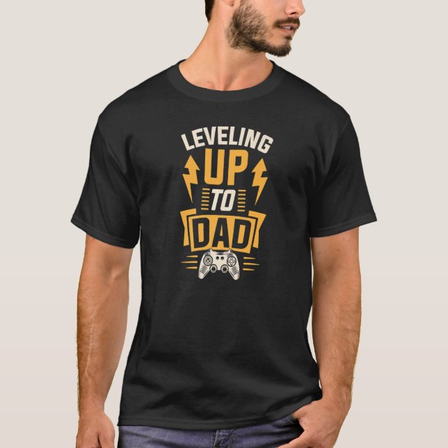 Camiseta Menores Nivelando Até Pai Gamer Grávida Annou (Frente)