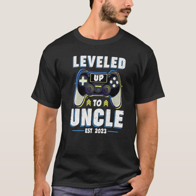 Camiseta Mens Levados Até O Tio EST 2023 Gamepad Game Con (Frente)
