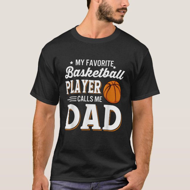 Camiseta Mens Meu Jogador De Basquete Favorito Me Chama De  (Frente)